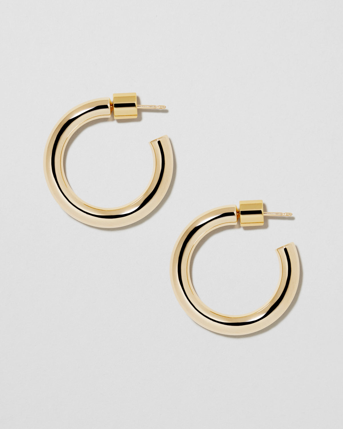 Lilly Huggies earring - alternate angle | gold hoop earrings for women
