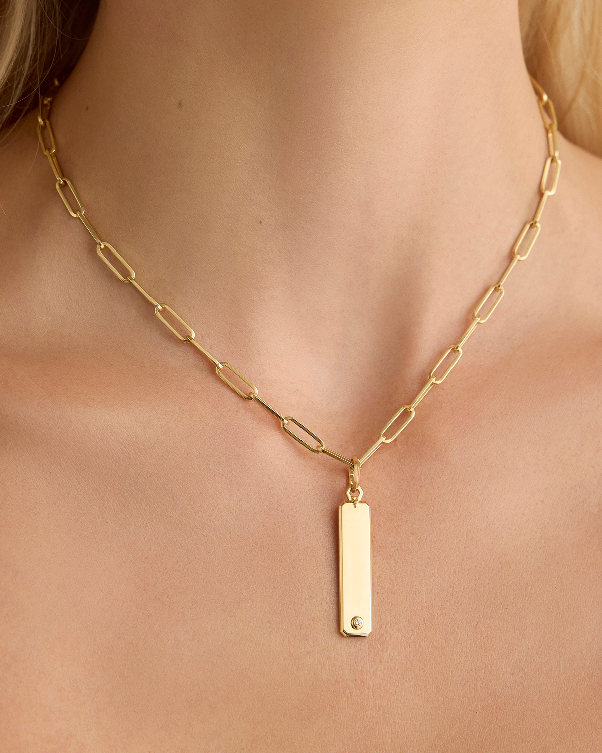 Beveled Dog Tag in 18K Yellow Gold gold charm - close-up detail | custom charm necklace
