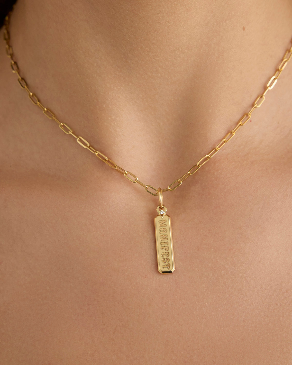 Small Mama Dog Tag in 18K Yellow gold charm - close-up detail | charm necklaces
