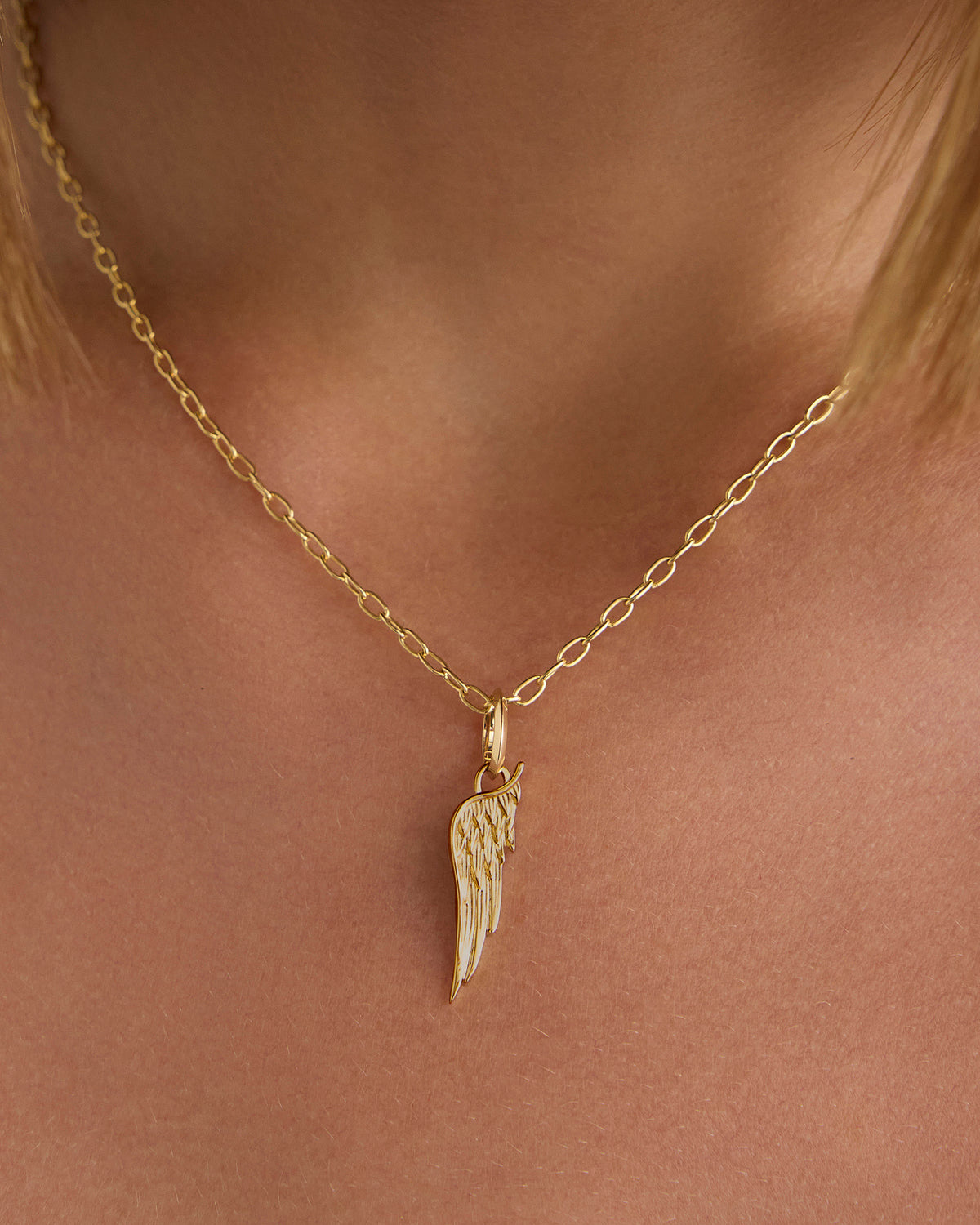 Small Wing Charm in 18K Yellow gold charm - close-up detail | charm necklaces