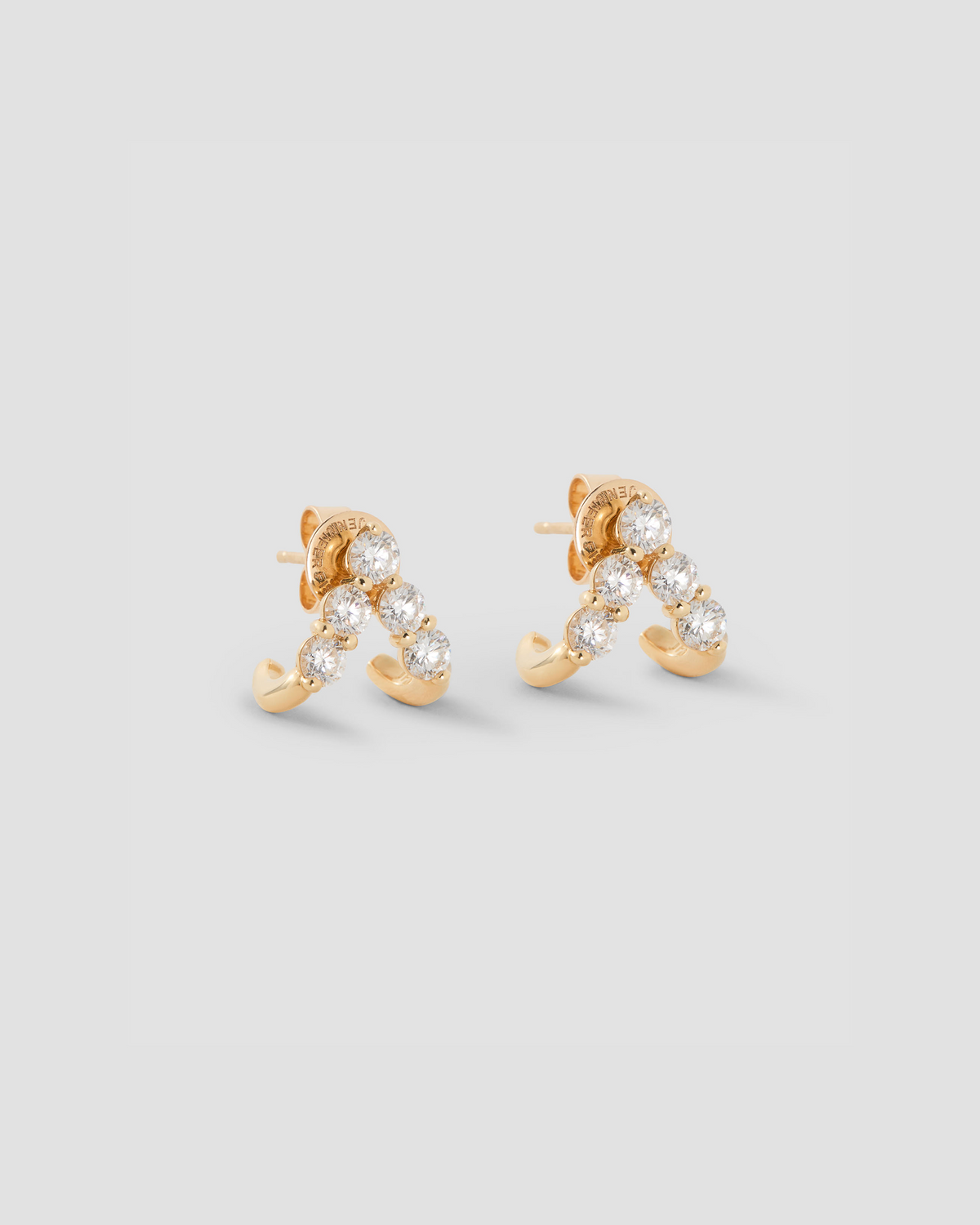 Floating Five Diamond Double Huggies 18K gold earring - front view | diamond huggie earrings