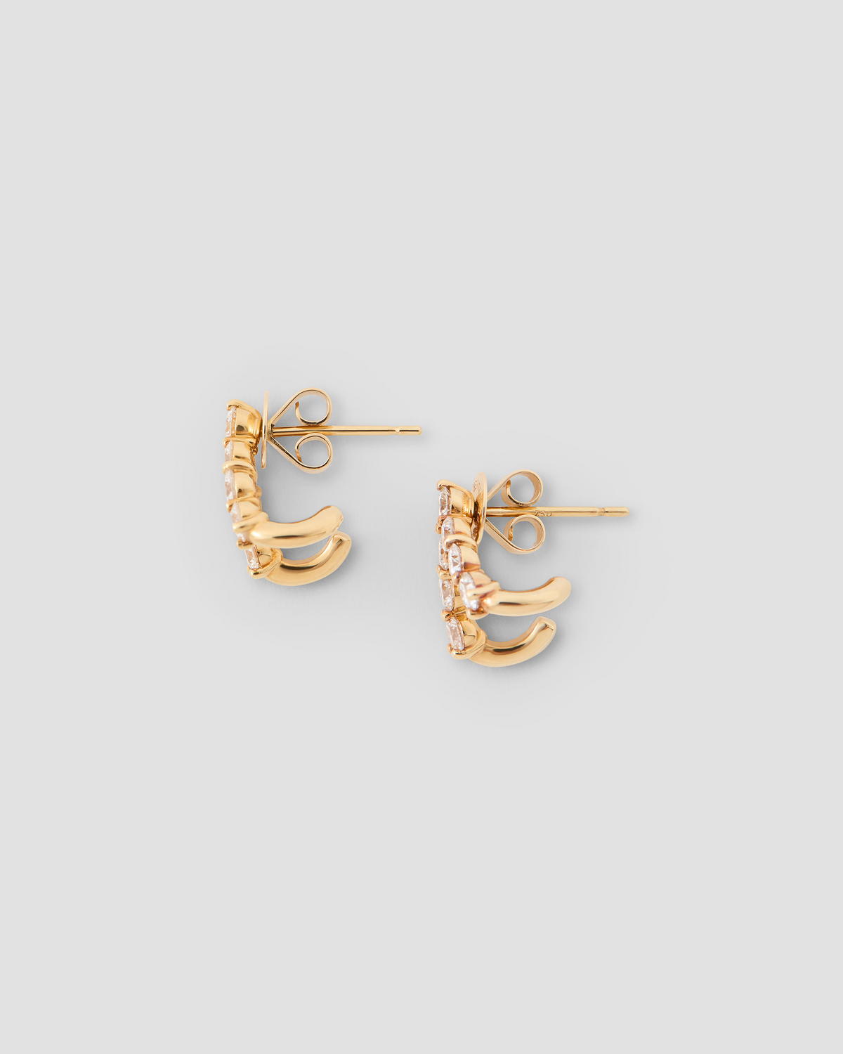 Floating Seven Diamond Double Huggies 18K gold earring - side view | diamond huggie earrings