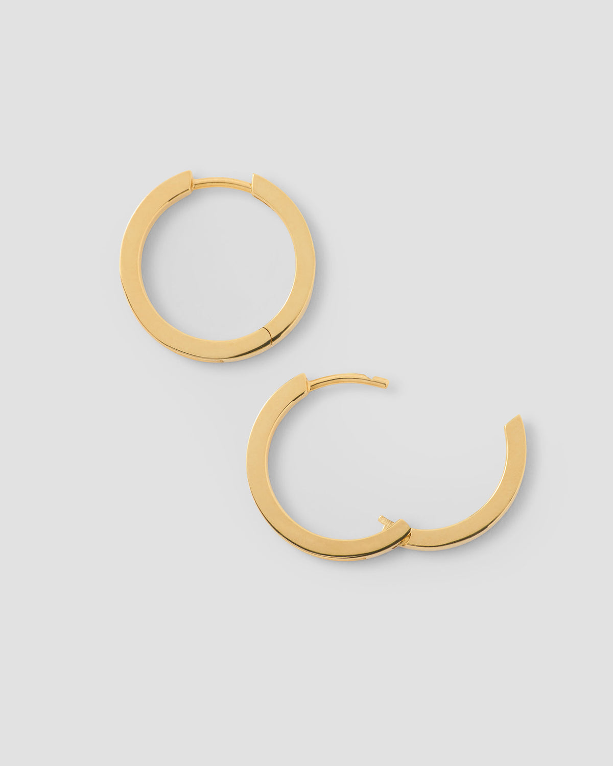 18k Huggie with Pavé Diamonds 18K gold earring - close-up detail | diamond huggie earrings