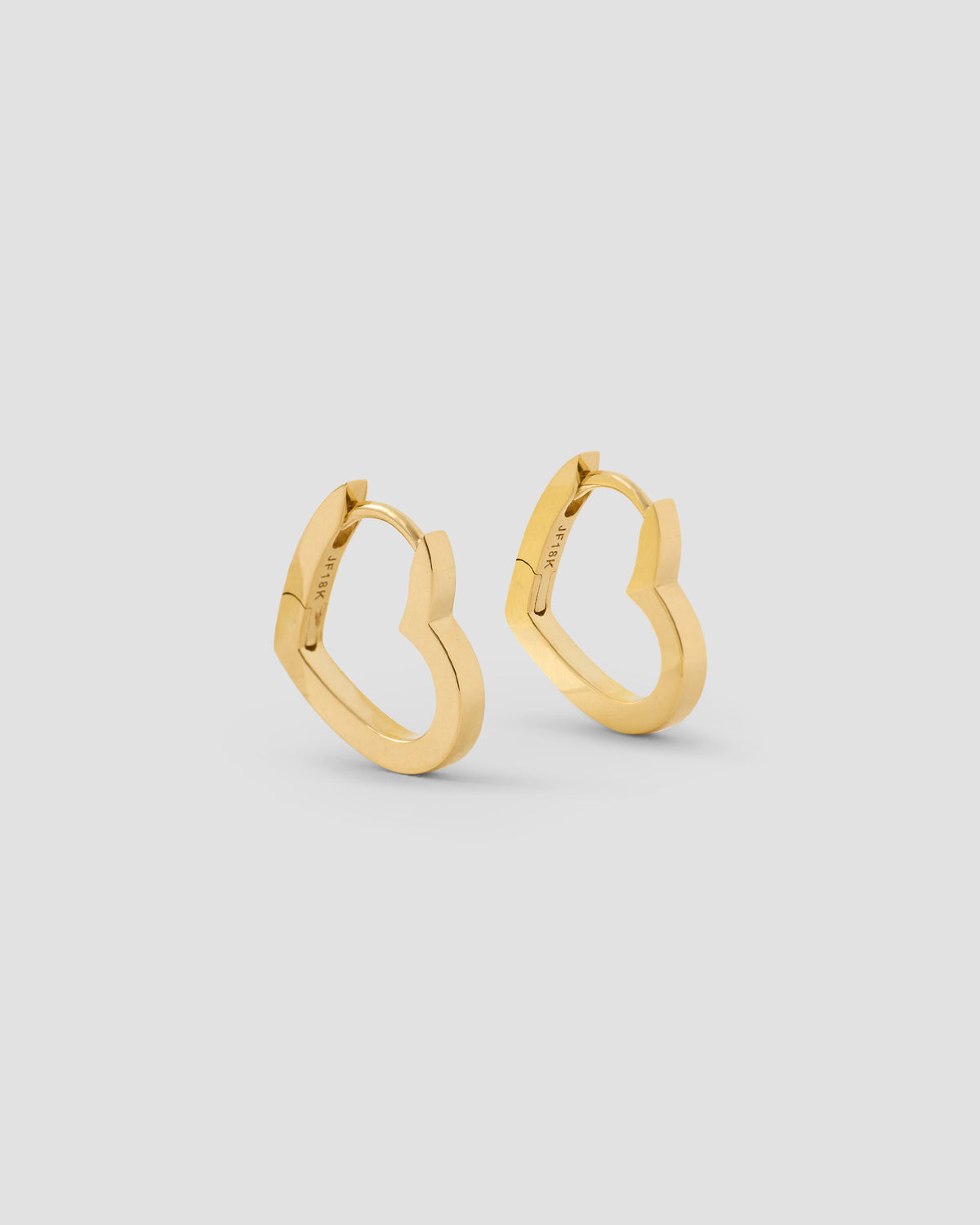 18k Small Heart Huggie earring - front view | gold huggie earrings