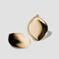 Puffy Cushion earrings on grey background.