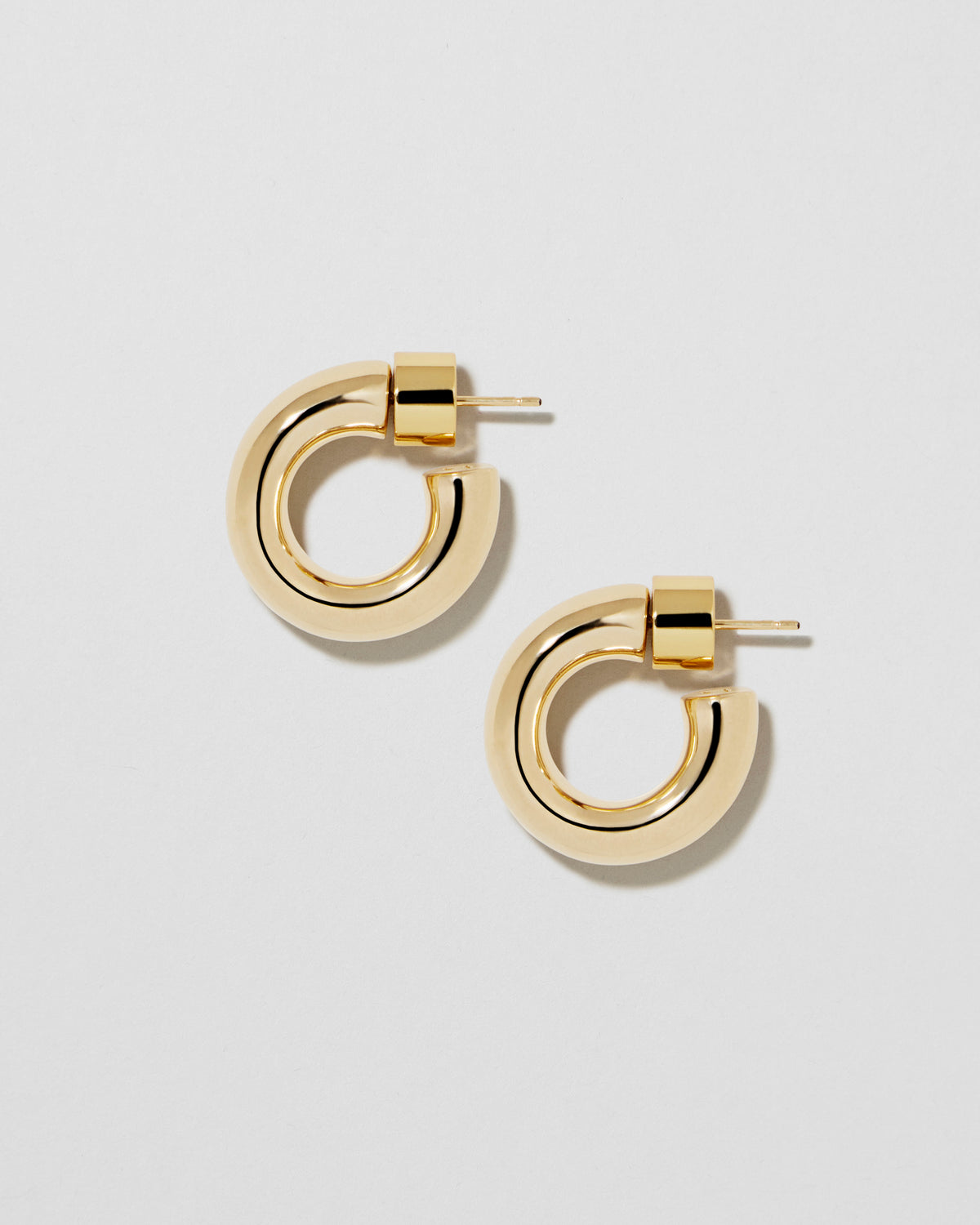 Samira Micro Huggies earring - alternate angle | gold huggie earrings