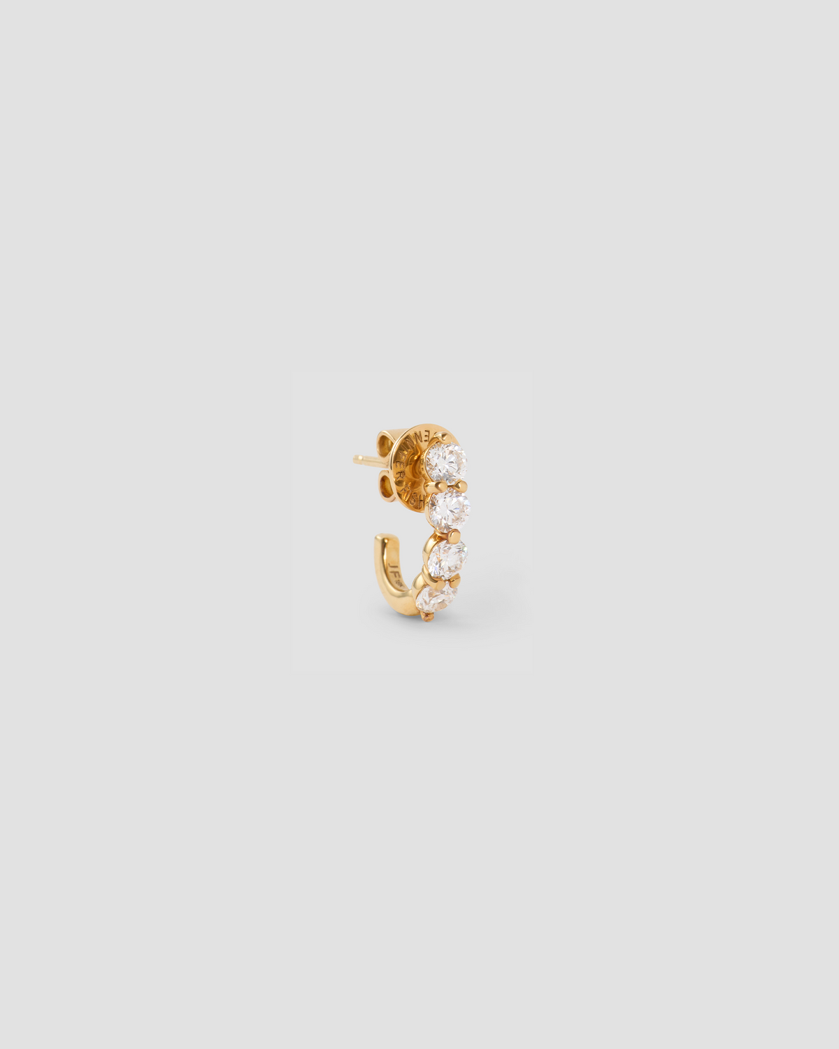 Floating Four Diamond Huggies gold earring - styled on model | diamond huggie earrings