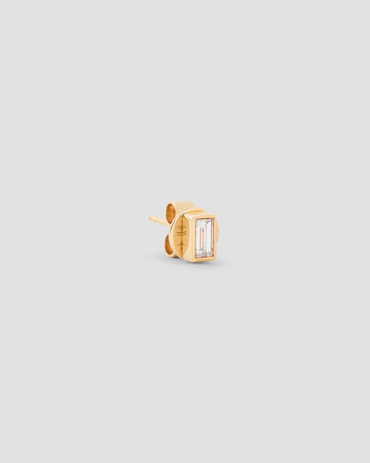 Baguette Diamond Stud Earring in 18K Yellow Gold earring - close-up detail | diamond stud earrings