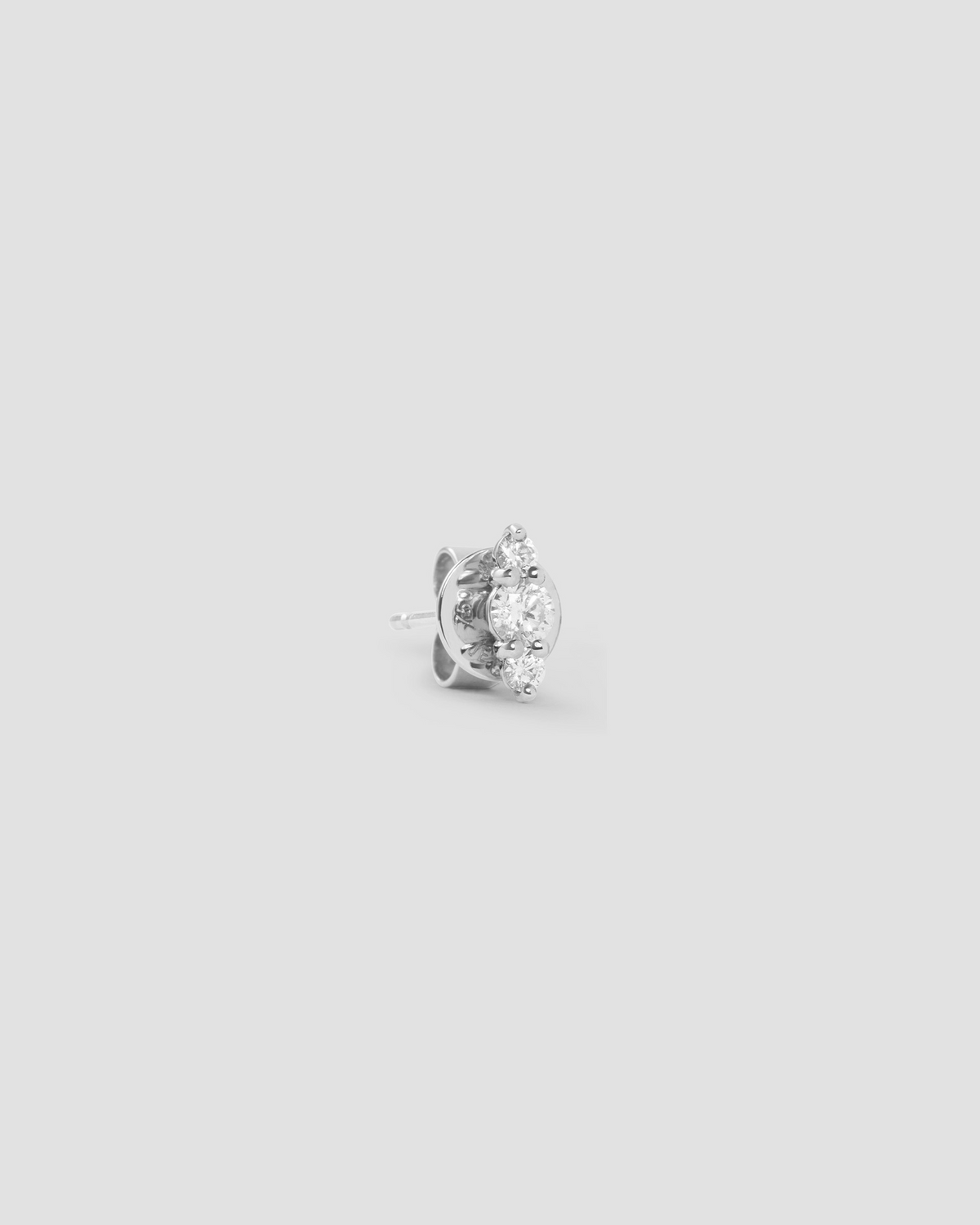 Floating Three Diamond Stud Earring gold earring - styled on model | diamond stud earrings