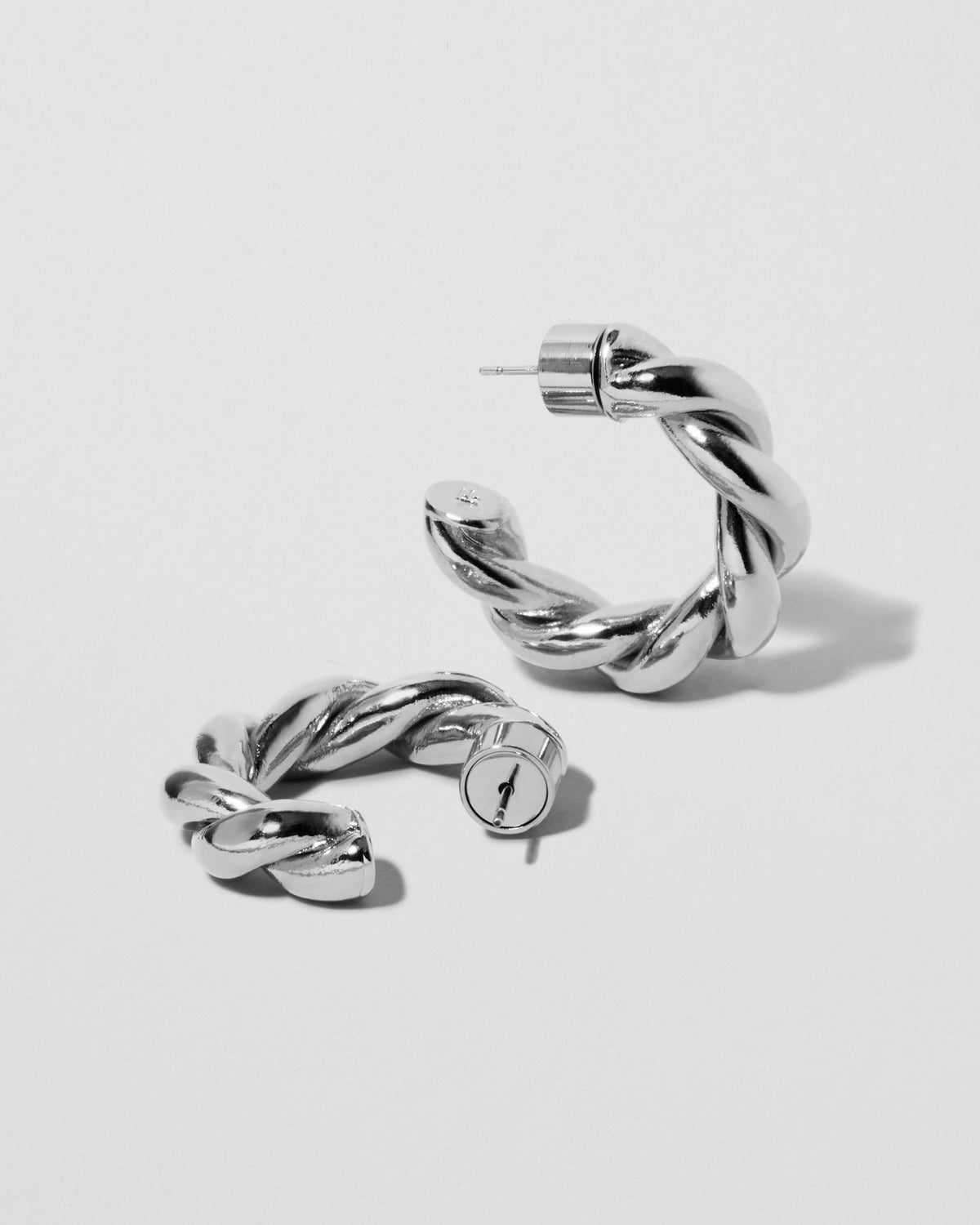 Twisted Lilly Huggies earring - front view | gold huggie earrings