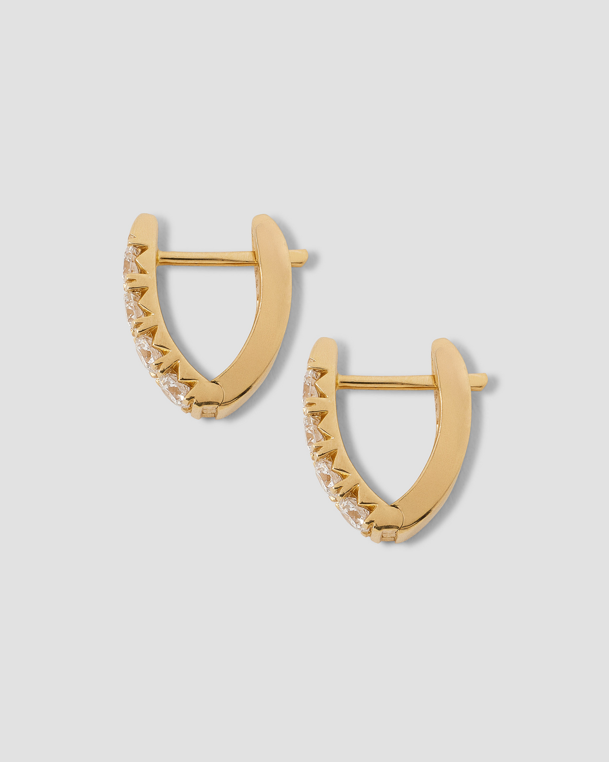 Lab Diamond Round Cut Huggie gold earring - close-up detail | lab grown diamond earrings