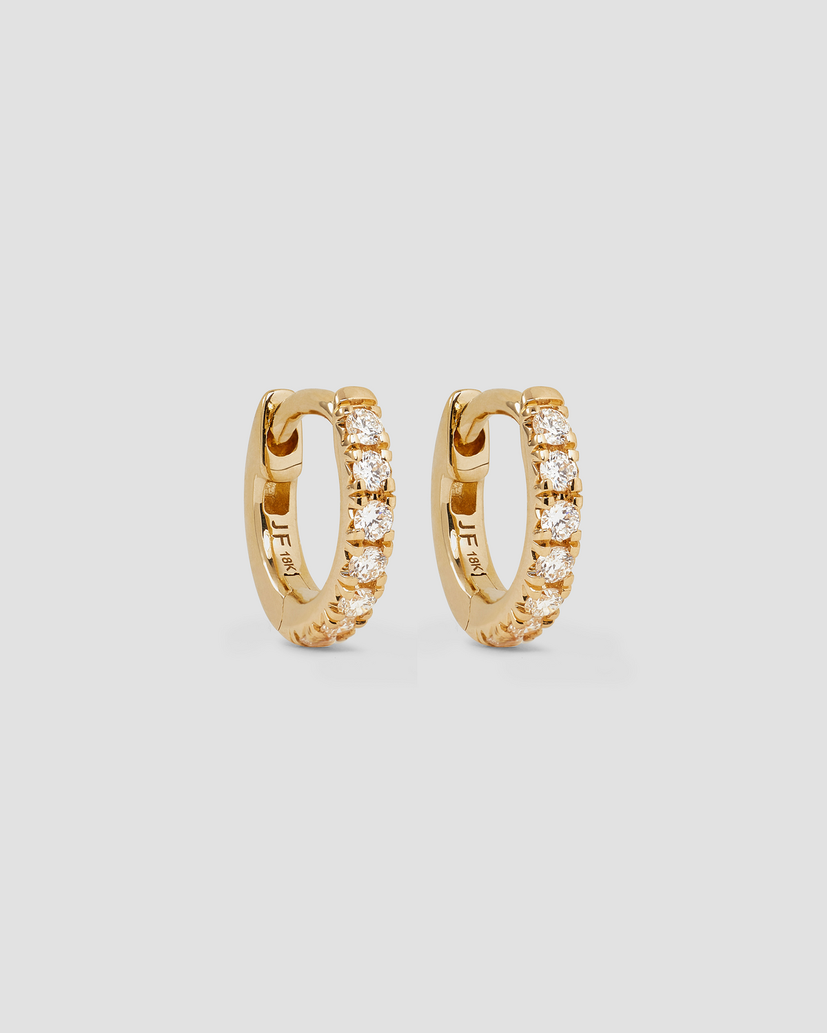 18K Essential Pavé Tiny Huggie gold earring - front view | diamond huggie earrings