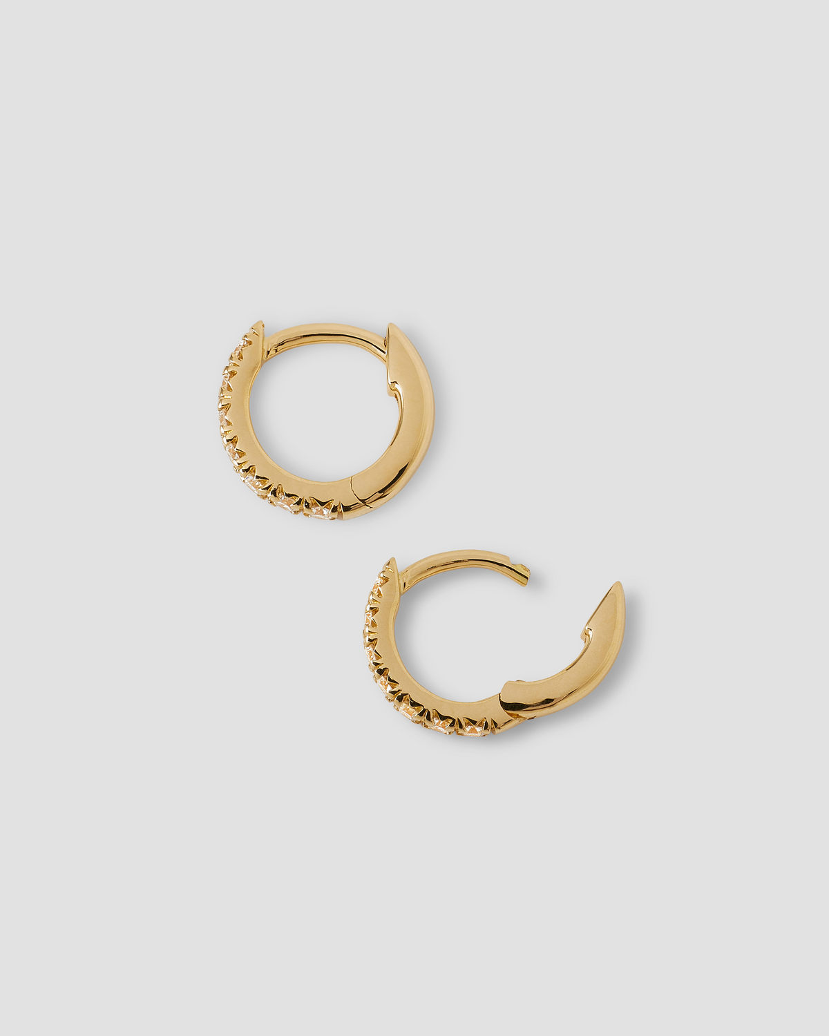 18K Essential Pavé Tiny Huggie gold earring - alternate angle | diamond huggie earrings