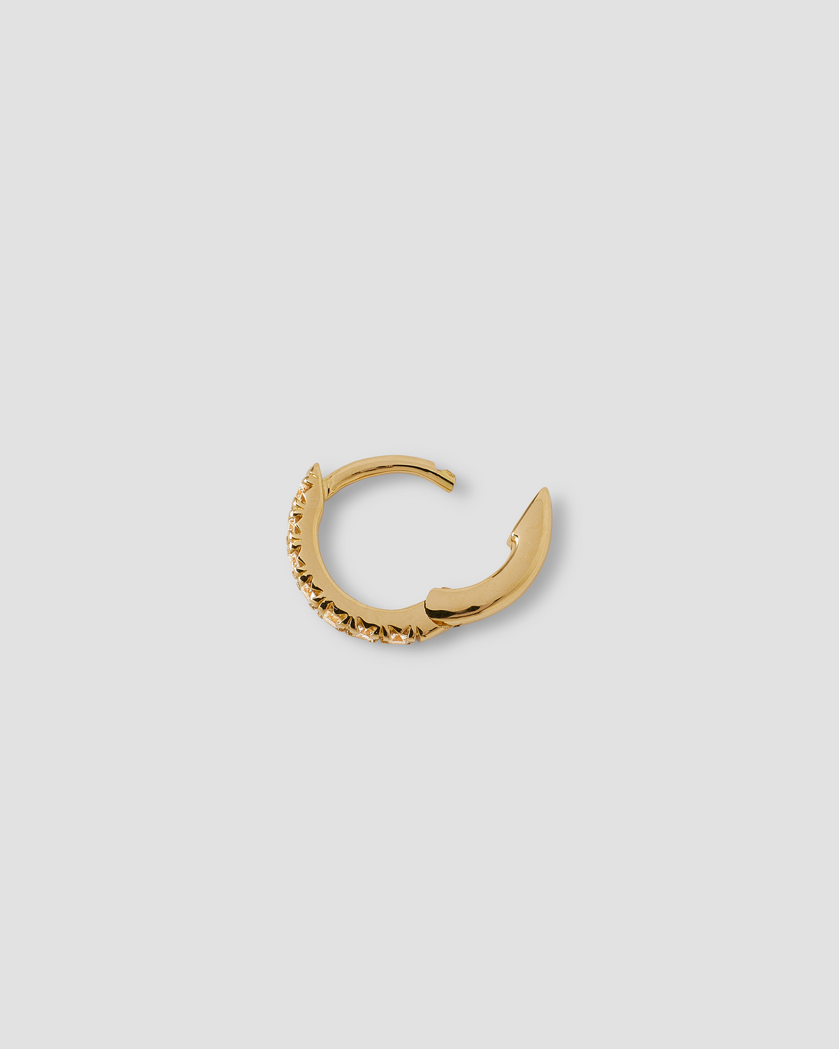 18K Essential Pavé Tiny Huggie gold earring - worn look | diamond huggie earrings